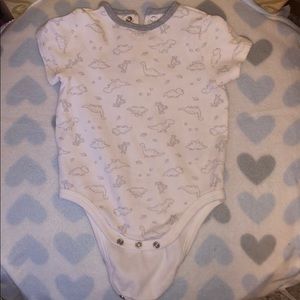 A gray and white onesie